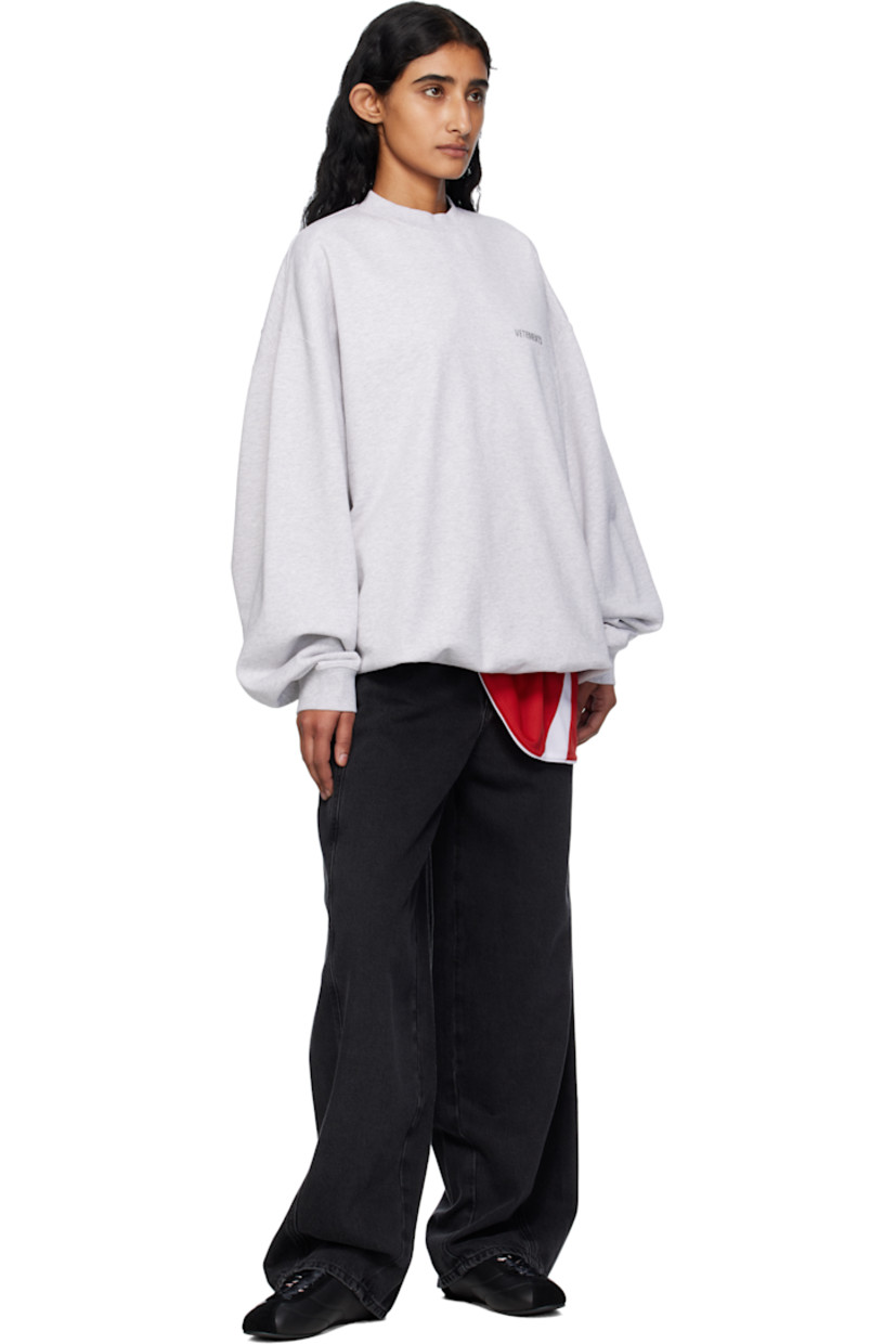 French terry sweatshirt.

· Rib-knit crewneck, hem, and cuffs
· Logo embroidered at chest and back collar
· Dropped shoulders

Supplier color: Grey melange