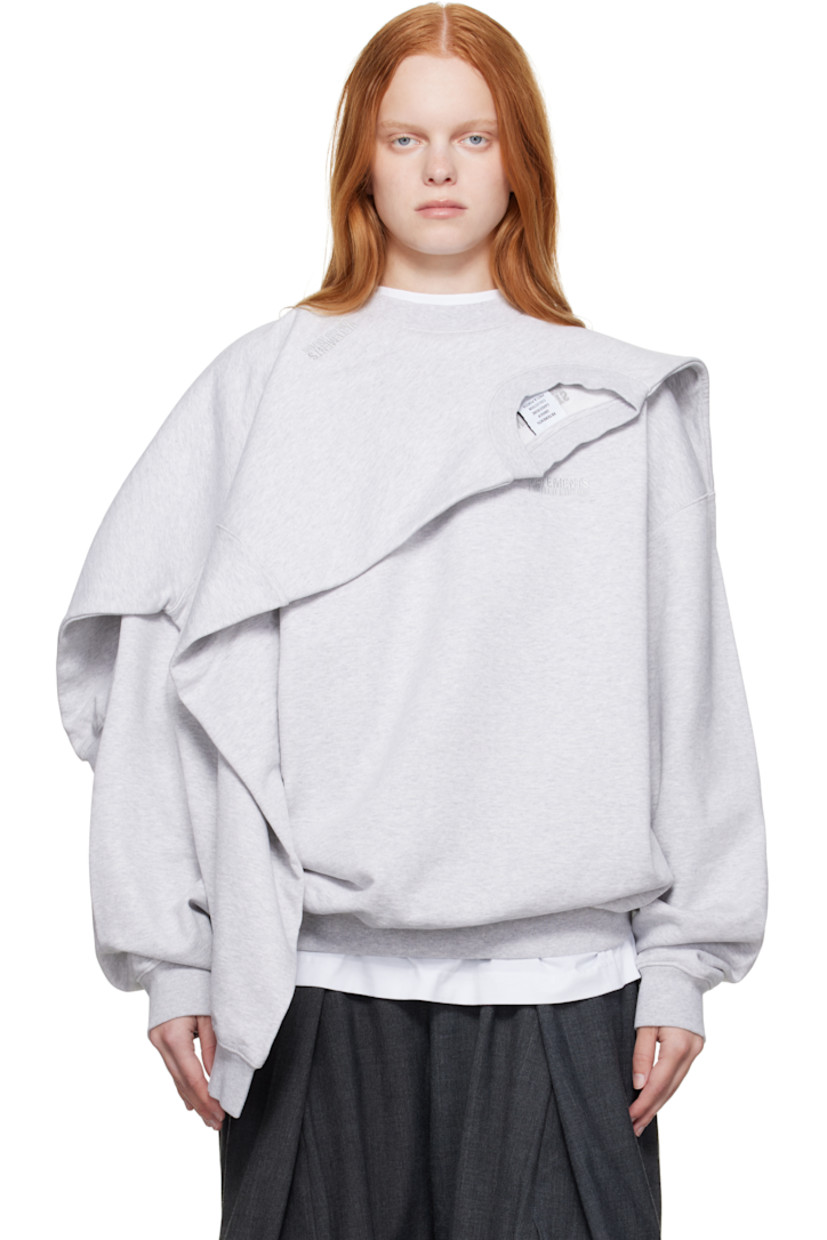 Cotton-blend French terry sweatshirt.

· Layered construction
· Rib-knit crewneck, hem, and cuffs
· Logo embroidered at chest 
· Dropped shoulders

Supplier color: Grey melange