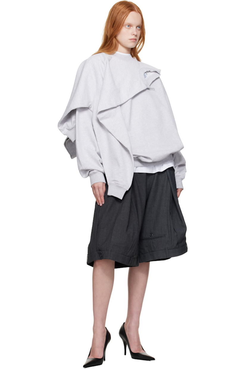Cotton-blend French terry sweatshirt.

· Layered construction
· Rib-knit crewneck, hem, and cuffs
· Logo embroidered at chest 
· Dropped shoulders

Supplier color: Grey melange