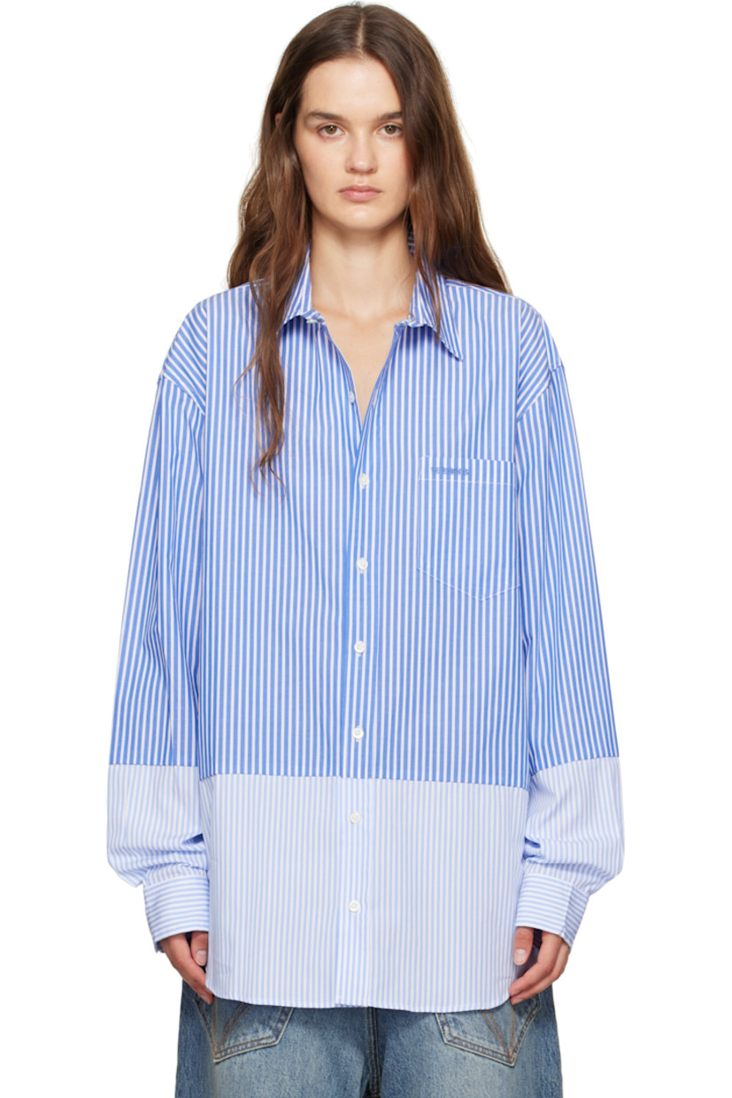 Cotton poplin shirt.

· Stripes throughout
· Paneled construction
· Spread collar
· Button closure
· Logo-embroidered patch pocket at chest
· Shirttail hem
· Buttoned barrel cuffs
· Pleats at back yoke

Supplier color: Light blue pinstripe