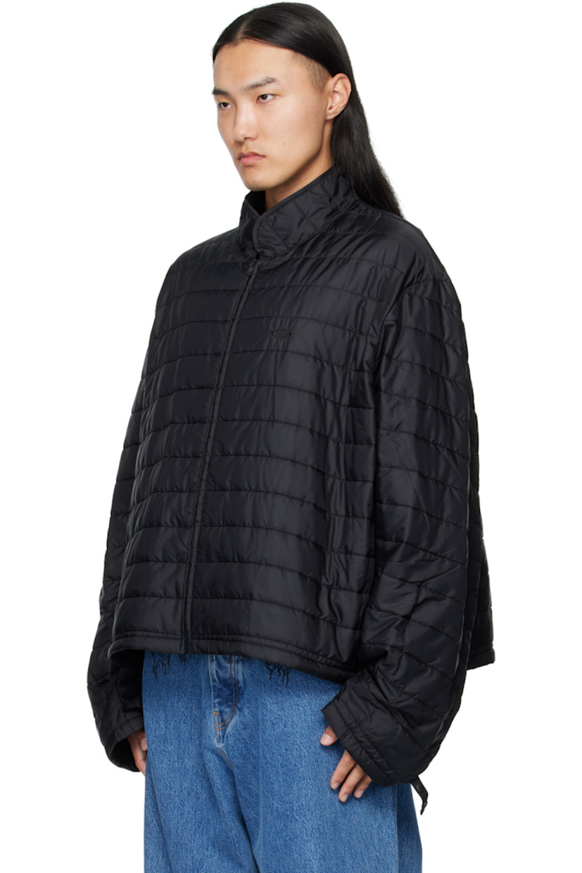 Heavyweight nylon canvas coat. Set includes long-sleeve technical canvas liner and insulated long-sleeve puffer liner.

· Three-piece construction
· Stand collar
· Concealed zip closure with press-stud closure
· Embroidered logo and zip pockets at chest and sleeves
· Flap pockets and integrated adjustable belt at waist
· Bungee-style drawstring at hem
· Adjustable compression tabs at sleeves
· Padding at lower sleeves
· Velcro tab at cuffs
· Rubber logo patch at back collar
· Full mesh lining

Supplier color: Black