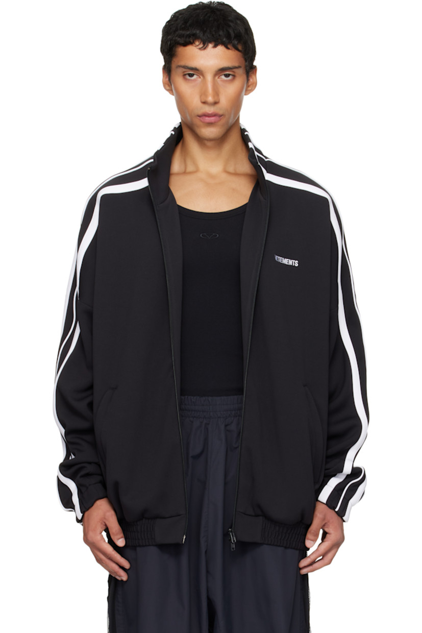 Jersey track jacket.

· Stand collar
· Two-way zip closure
· Logo embroidered at chest and back
· Zip pockets at front
· Elasticized hem and cuffs
· Dropped shoulders
· Stripe appliqués at sleeves
· Full mesh lining

Supplier color: Black