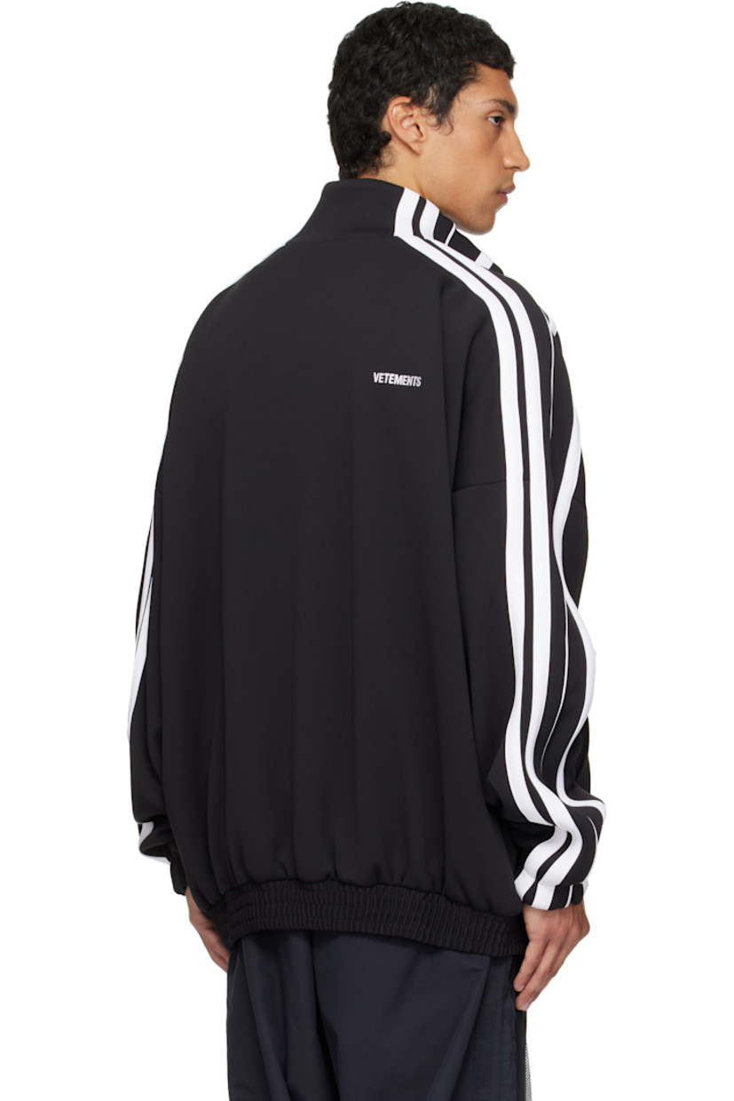 Jersey track jacket.

· Stand collar
· Two-way zip closure
· Logo embroidered at chest and back
· Zip pockets at front
· Elasticized hem and cuffs
· Dropped shoulders
· Stripe appliqués at sleeves
· Full mesh lining

Supplier color: Black