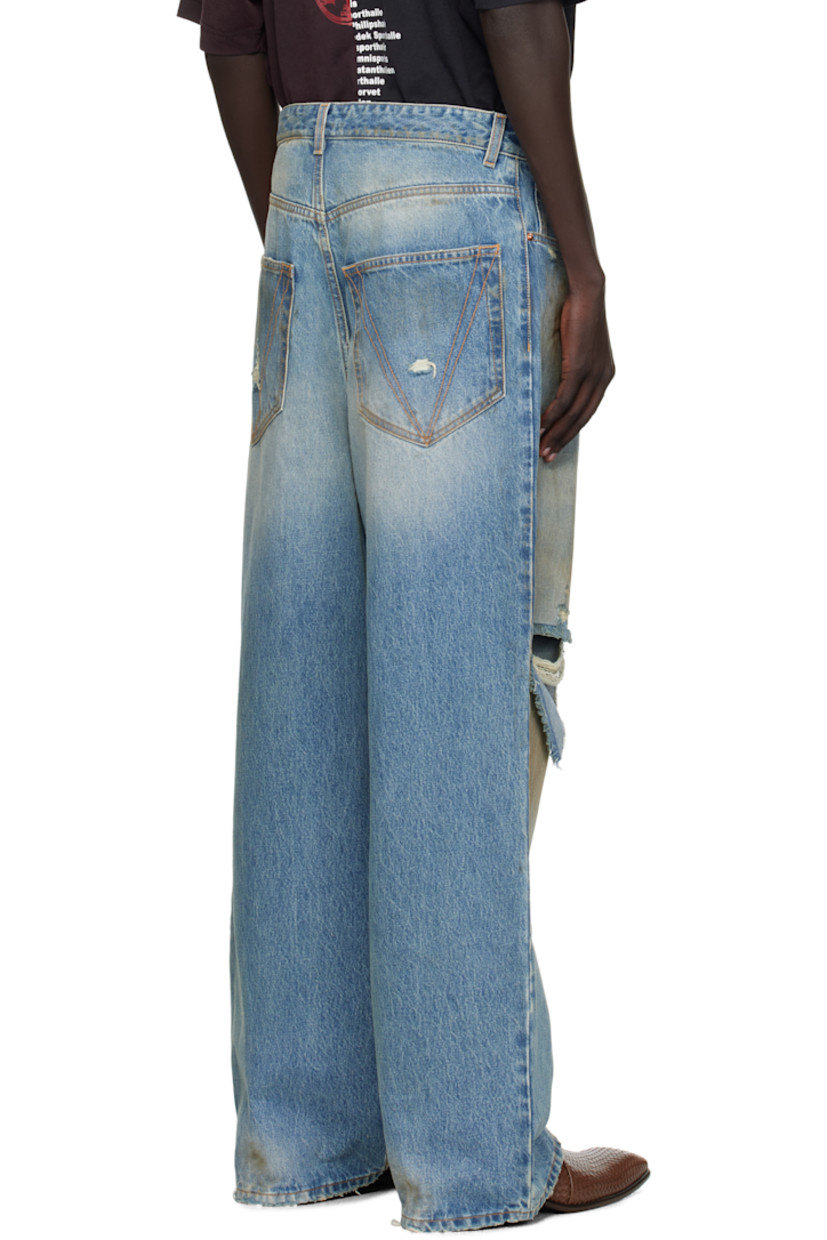 Non-stretch denim jeans. 

· Fading, smudging, whiskering, and distressing throughout 
· Belt loops
· Five-pocket styling
· Zip fly 
· Rip at knee
· Logo topstitching at back pockets
· Contrast stitching in tan

Supplier color: Distressed light blue