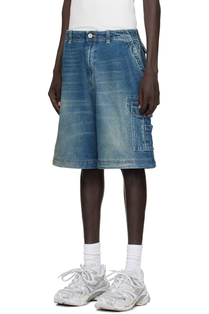 Non-stretch denim cargo pants. 

· Fading and whiskering throughout 
· Belt loops
· Four-pocket styling
· Zip fly 
· Cargo pockets at outseams
· Zip fastening at knees for shorts styling
· Contrast stitching in beige

Supplier color: Vintage navy