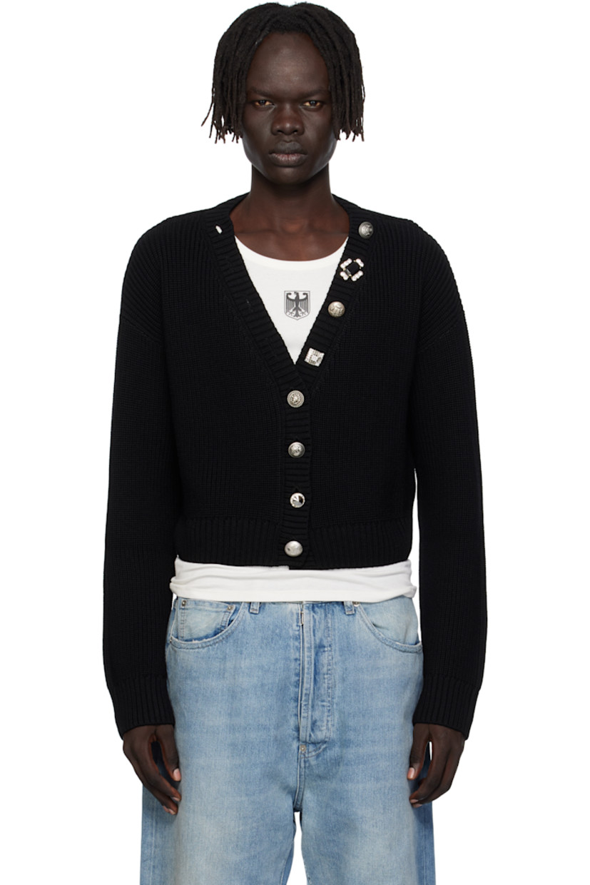 Rib-knit merino wool cardigan.

· V-neck
· Button closure extends to neck
· Cropped hem
· Dropped shoulders
· Engraved and crystal-cut hardware

Supplier color: Black