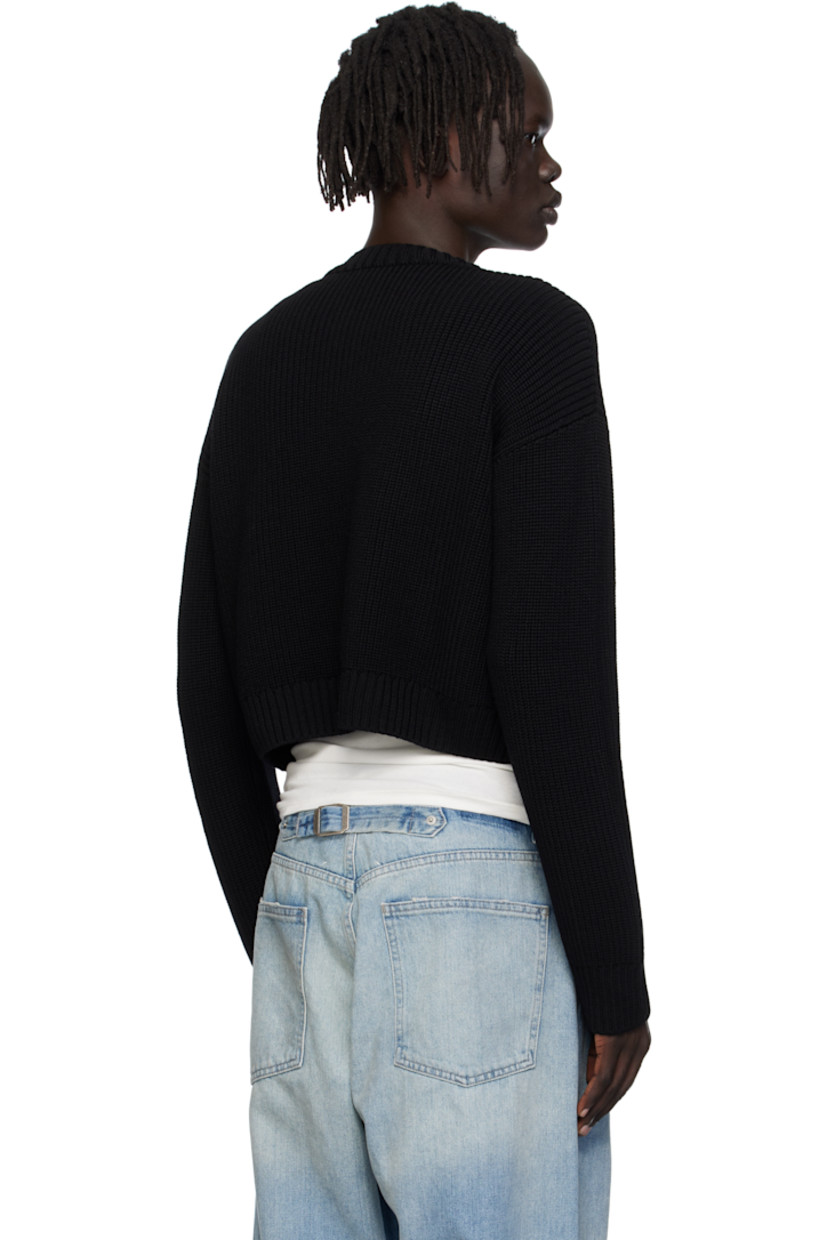 Rib-knit merino wool cardigan.

· V-neck
· Button closure extends to neck
· Cropped hem
· Dropped shoulders
· Engraved and crystal-cut hardware

Supplier color: Black