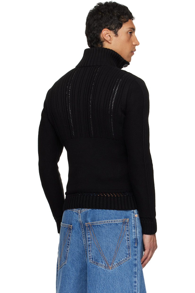 Rib-knit cotton cardigan.

· Stand collar
· Button closure
· Embroidered logo and patch pockets at front

Supplier color: Black