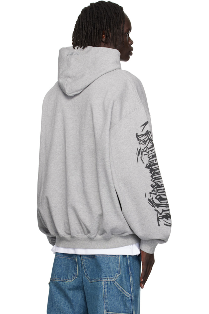 Cotton-blend French terry hoodie.

· Drawstring at hood
· Graphic printed at front
· Kangaroo pocket
· Rib-knit hem and cuffs
· Dropped shoulders
· Text and graphic printed at sleeves

Supplier color: Grey melange
