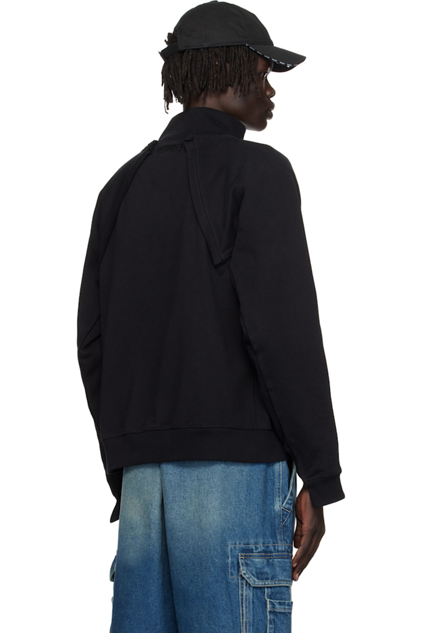 Cotton-blend French terry sweatshirt.

· Raw edges throughout
· Paneled construction
· Stand collar
· Two-way zip closure
· Embroidered text at chest
· Welt pockets at waist
· Rib-knit hem and cuffs
· Raglan sleeves
· Logo embroidered at back collar

Supplier color: Black