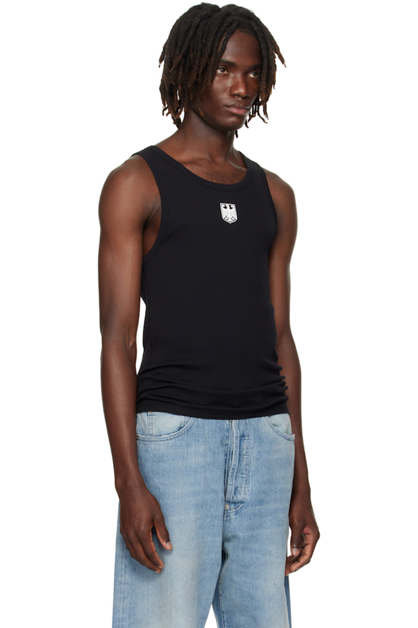 Rib-knit stretch cotton tank top.

· Scoop neck
· Graphic printed at chest
· Logo embroidered at back collar

Supplier color: Black