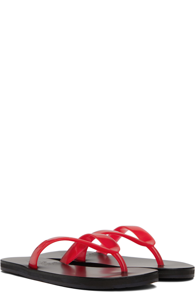 Handcrafted semi-transparent vinyl flip-flops.

· Logo-embossed thong-style strap
· Vegetable-tanned buffed leather footbed
· Hand-stitched stacked leather midsole
· Logo-embossed rubber sole

Supplier color: Clear red