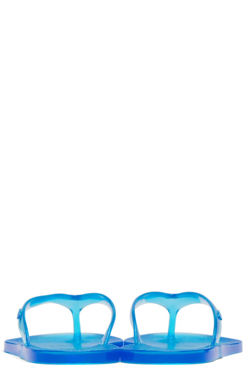 Handcrafted semi-transparent vinyl flip-flops. 

· Logo-embossed thong-style strap
· Logo-embossed rubber sole

Supplier color: Blue