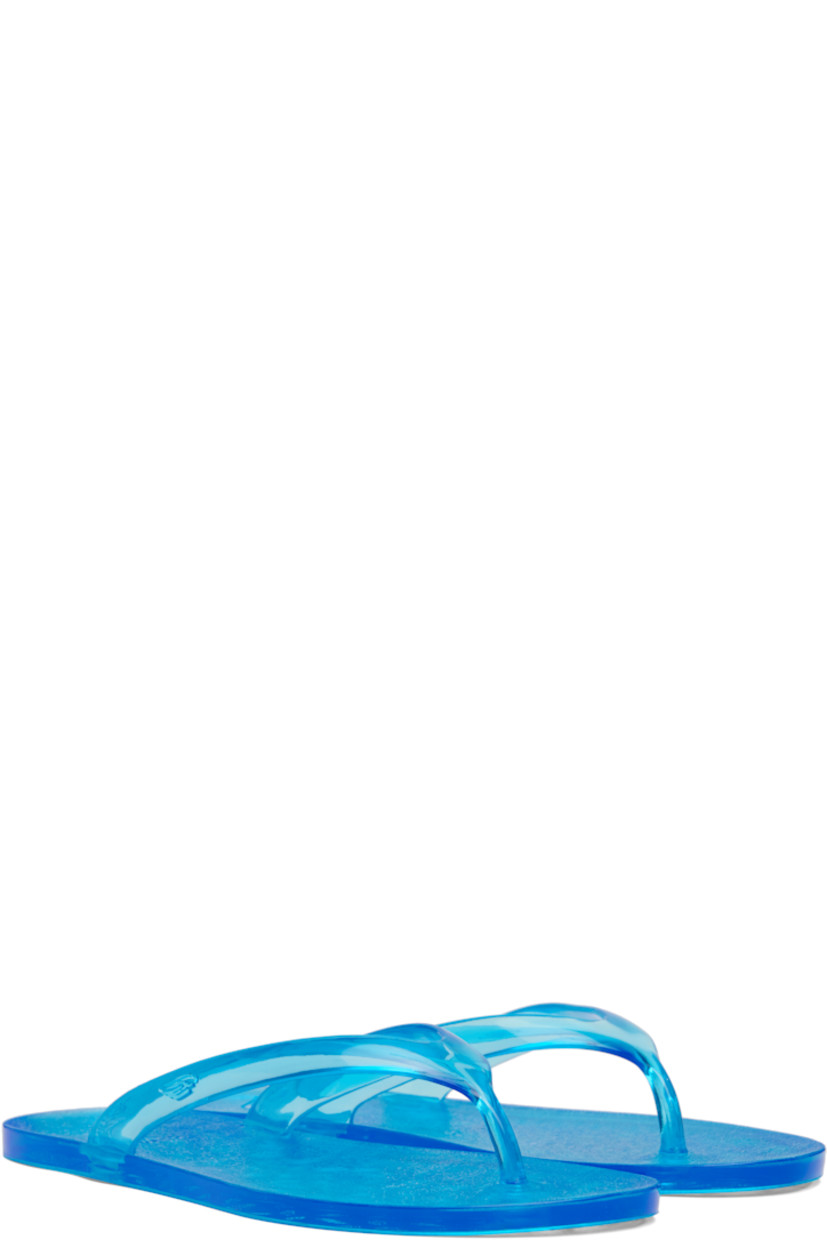 Handcrafted semi-transparent vinyl flip-flops. 

· Logo-embossed thong-style strap
· Logo-embossed rubber sole

Supplier color: Blue