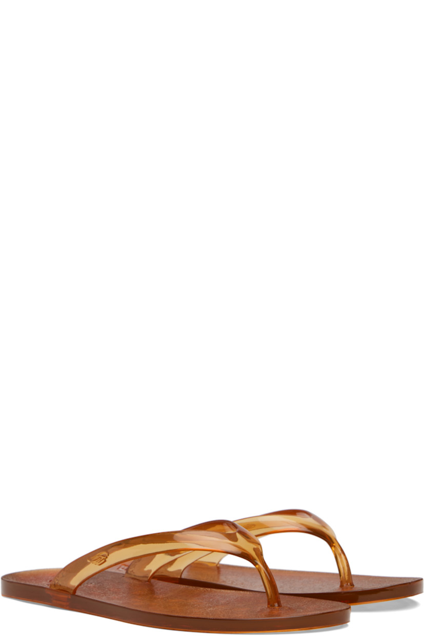 Handcrafted semi-transparent vinyl flip-flops. 

· Logo-embossed thong-style strap
· Logo-embossed rubber sole

Supplier color: Caramel