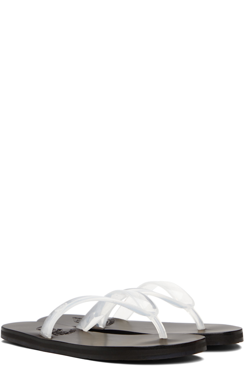 Handcrafted transparent vinyl flip-flops.

· Logo-embossed thong-style strap
· Vegetable-tanned buffed leather footbed
· Hand-stitched stacked leather midsole
· Logo-embossed rubber sole

Supplier color: Clear