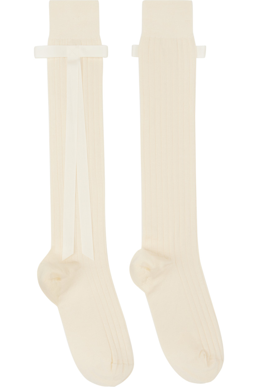 Pair of knee-high rib-knit stretch cotton-blend socks in off-white. Bow appliqué at cuffs.

Part of the exclusive SSENSE Bridal capsule.

Supplier color: Tofu