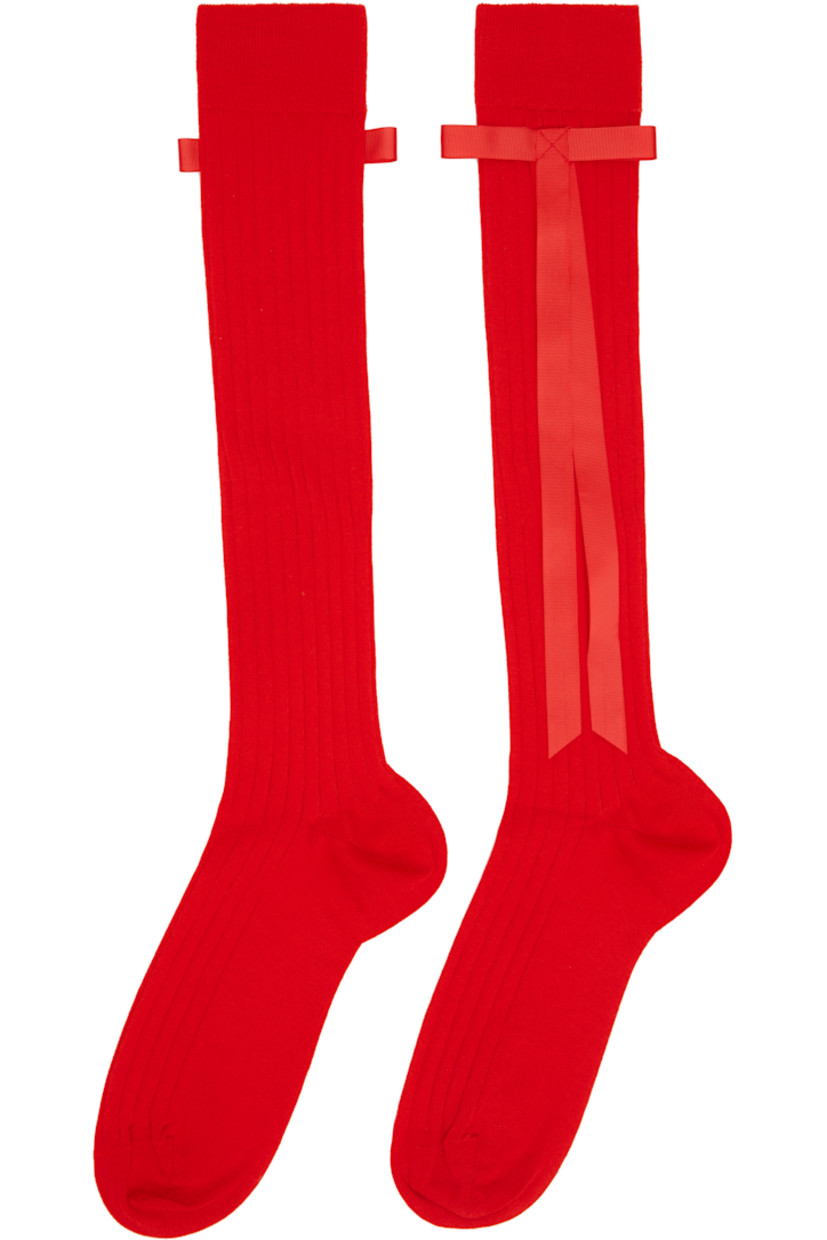 Pair of knee-high rib-knit stretch cotton-blend socks. Grosgrain bow accent at cuffs.

Available exclusively at SSENSE.

Supplier color: Red