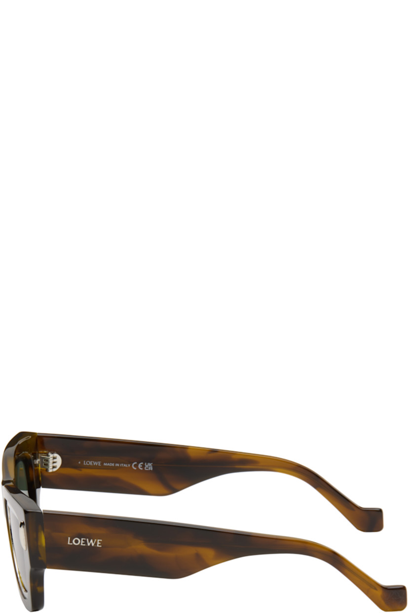 Square tortoiseshell acetate-frame sunglasses.

· Metal rim in silver tone at green lenses
· 100% UVA/UVB protection, category 3
· Integrated nose pads
· Studs at face
· Inset logo at temples
· Partially exposed core wires 
· Logo etched at temple tips 
· Includes pouch
· Size: 53.17 145

Supplier color: Dark Havana/Green