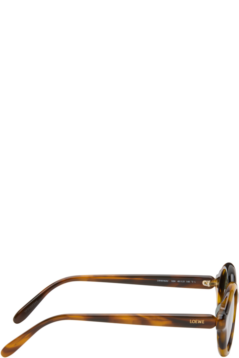 Oval tortoiseshell acetate-frame sunglasses.

· Green lenses 
· 100% UVA/UVB protection, category 3
· Integrated nose pads
· Inset logo at temples
· Exposed core wires
· Gold-tone hardware
· Includes pouch
· Size: 48.21 140

Supplier color: Havana special