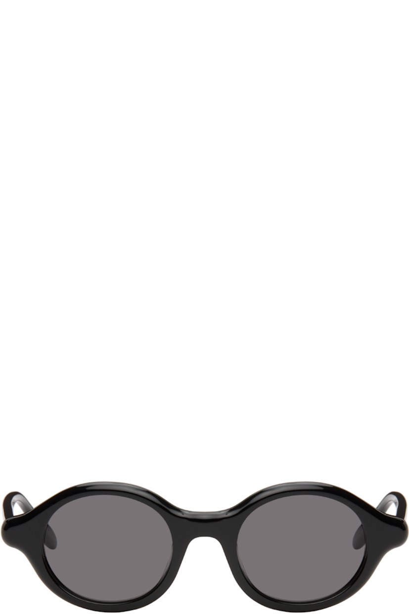 Oval acetate-frame sunglasses.

· Gray lenses 
· 100% UVA/UVB protection, category 3
· Integrated nose pads
· Inset logo at temples
· Gold-tone hardware
· Includes pouch
· Size: 48.21 140

Supplier color: Black