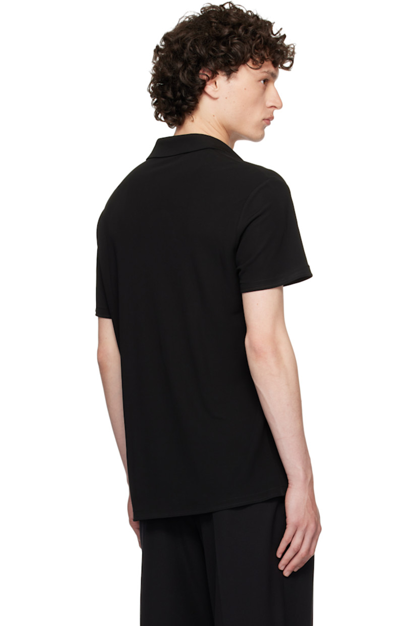 Knit viscose polo.

· Open spread collar
· Extended satin trim at front
· Satin trim at interior seams

Supplier color: Black