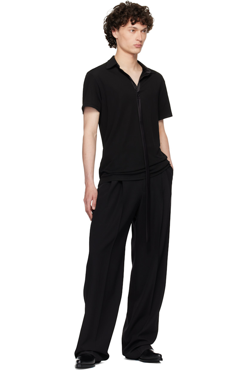Knit viscose polo.

· Open spread collar
· Extended satin trim at front
· Satin trim at interior seams

Supplier color: Black