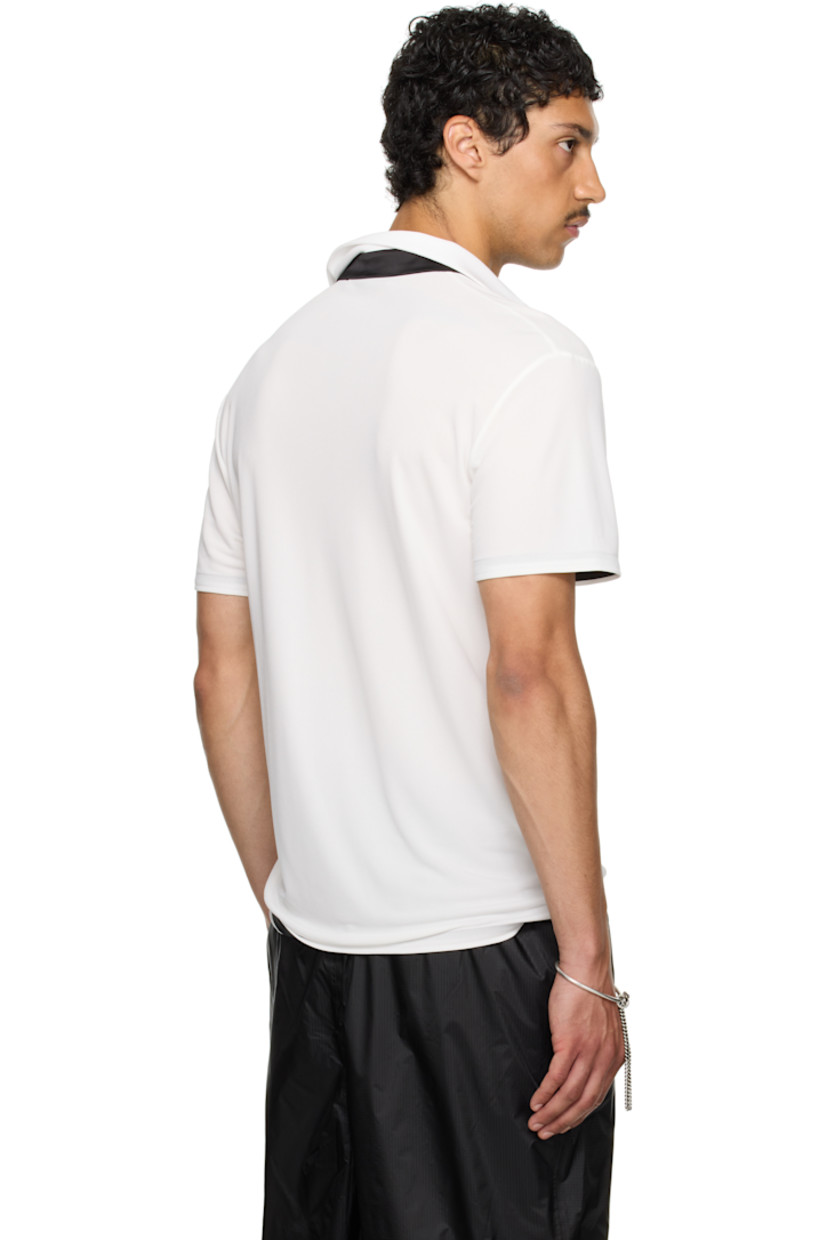 Viscose jersey polo.

· Rib-knit spread collar
· Extended satin trim at open placket

Part of the exclusive SSENSE HEAT capsule. 

Supplier color: White/Black