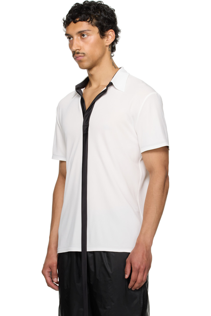 Viscose jersey polo.

· Rib-knit spread collar
· Extended satin trim at open placket

Part of the exclusive SSENSE HEAT capsule. 

Supplier color: White/Black