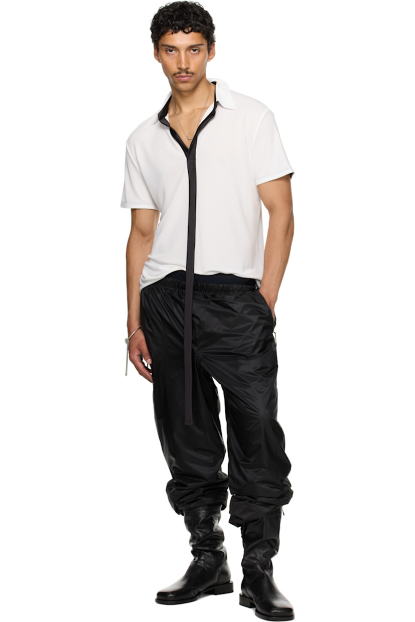 Viscose jersey polo.

· Rib-knit spread collar
· Extended satin trim at open placket

Part of the exclusive SSENSE HEAT capsule. 

Supplier color: White/Black