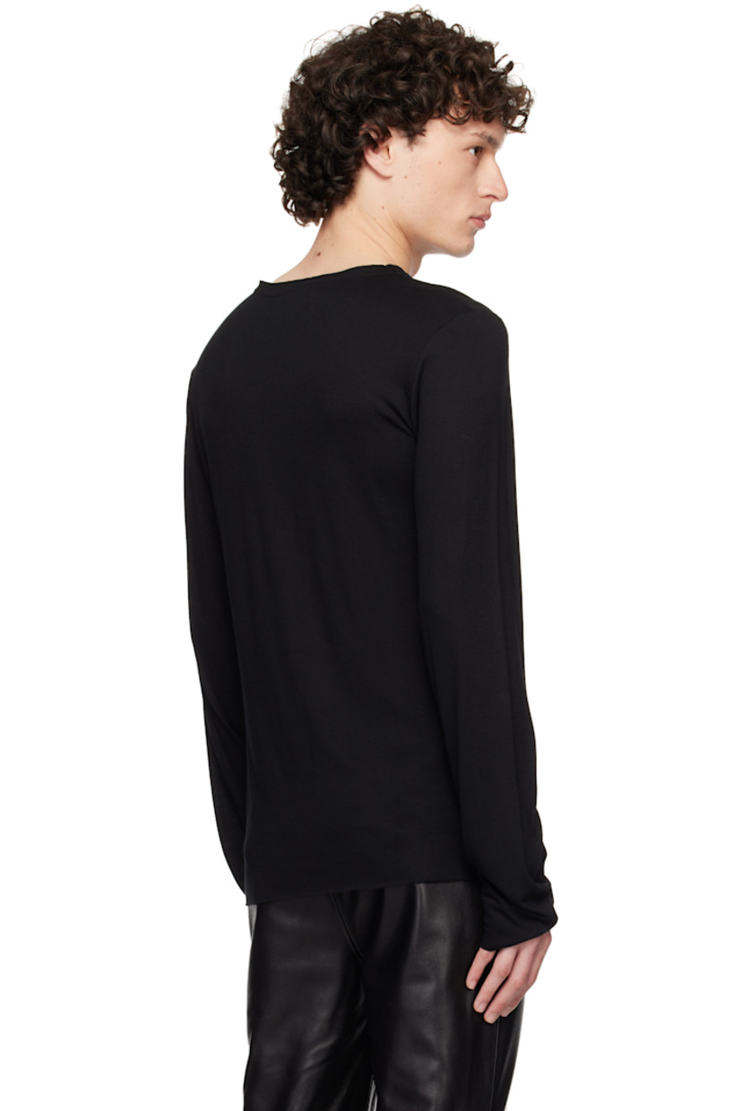 Semi-sheer viscose jersey T-shirt. Raw edges throughout.

· Round neck
· Satin trim at interior seams

Supplier color: Black
