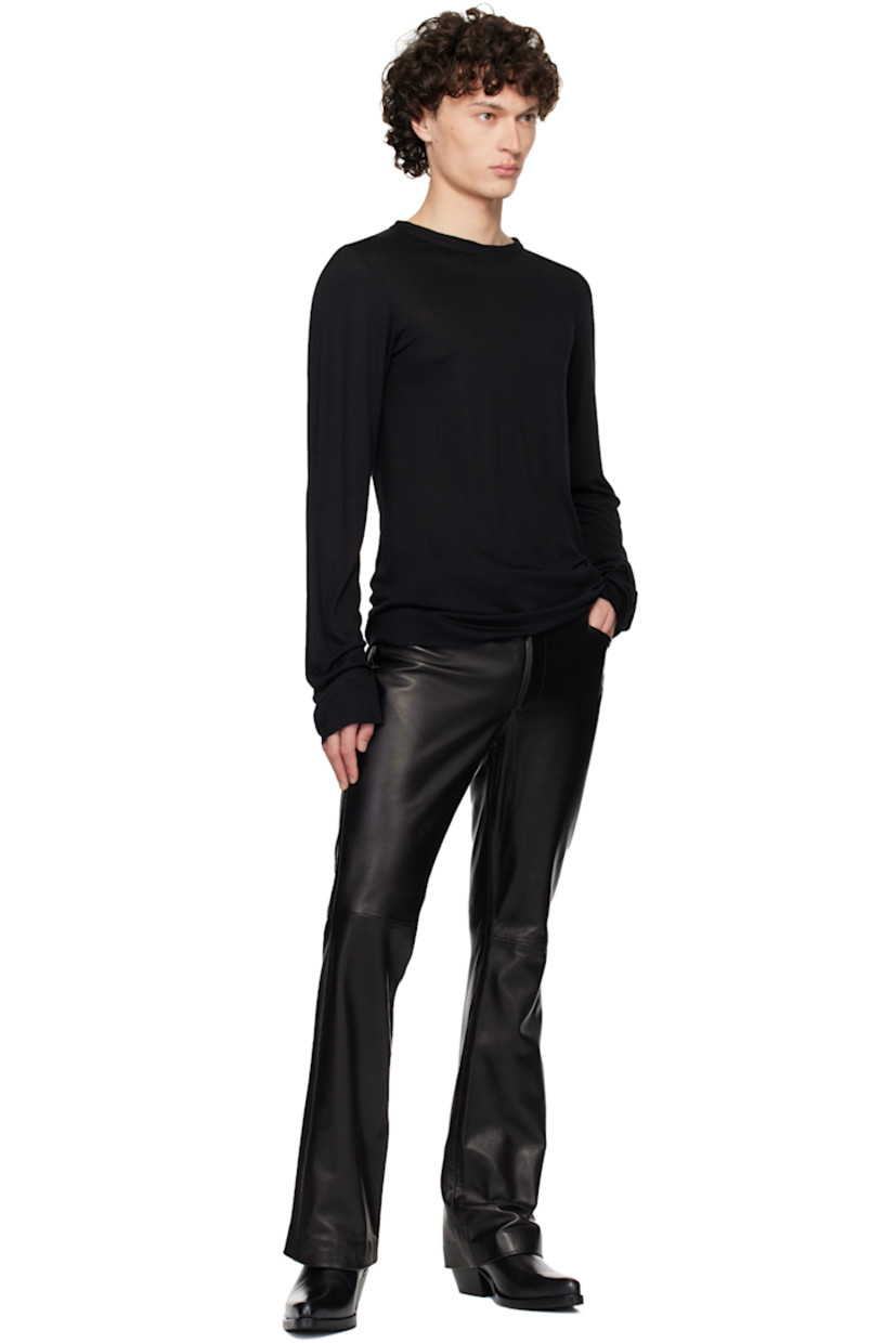 Semi-sheer viscose jersey T-shirt. Raw edges throughout.

· Round neck
· Satin trim at interior seams

Supplier color: Black