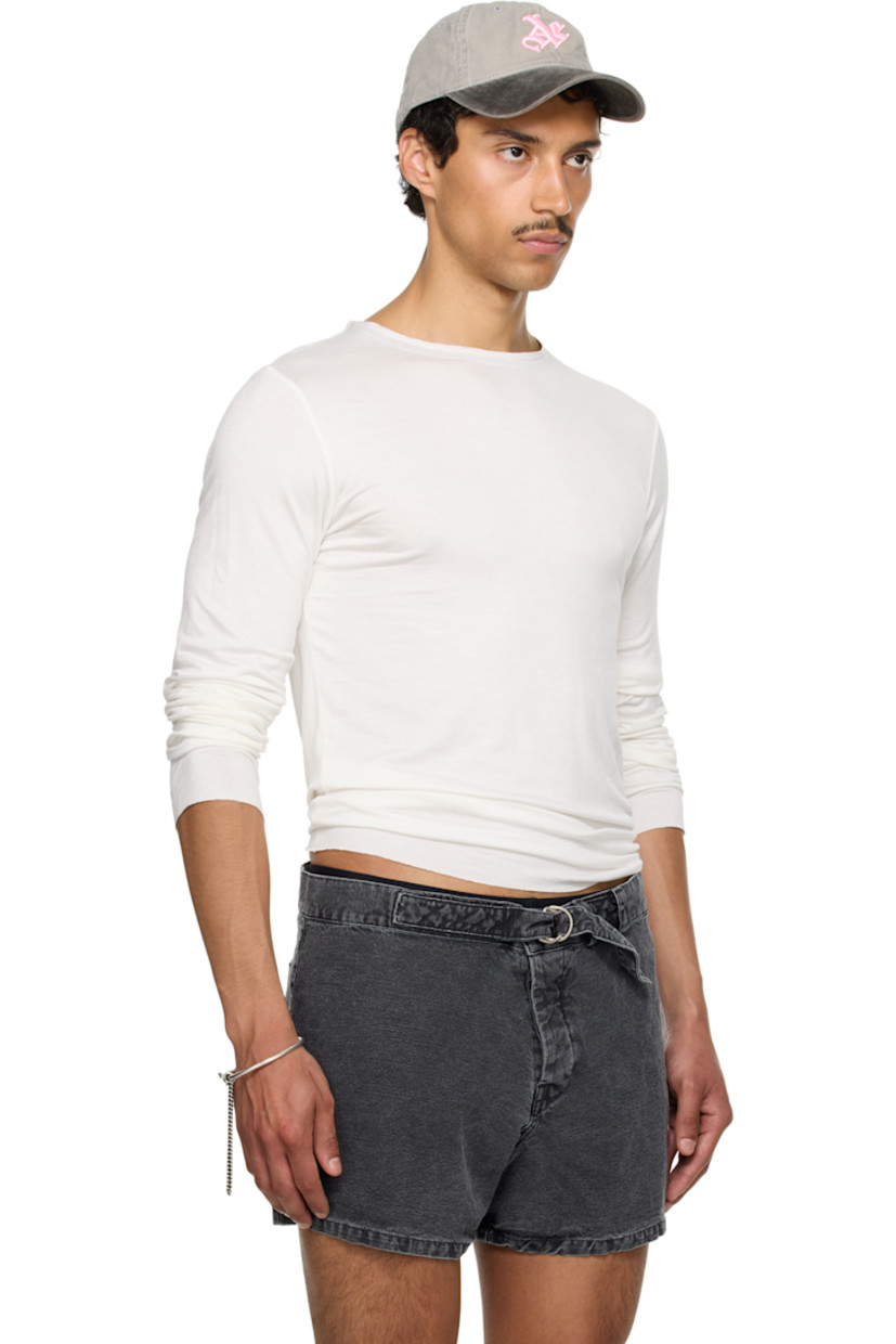 Polyester jersey T-shirt.

· Raw edge at crewneck, hem, and cuffs
· Satin trim at inner collar

Part of the exclusive SSENSE HEAT capsule. 

Supplier color: White jersey
