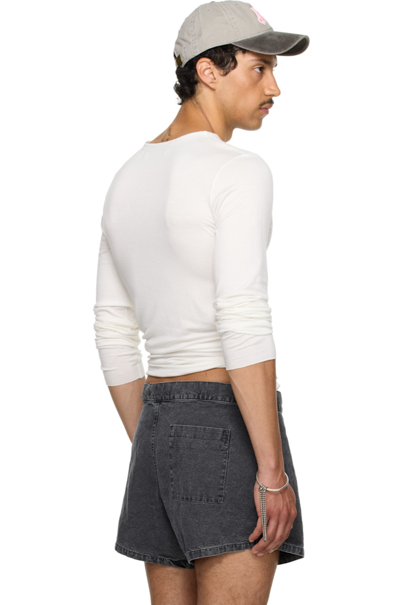 Polyester jersey T-shirt.

· Raw edge at crewneck, hem, and cuffs
· Satin trim at inner collar

Part of the exclusive SSENSE HEAT capsule. 

Supplier color: White jersey