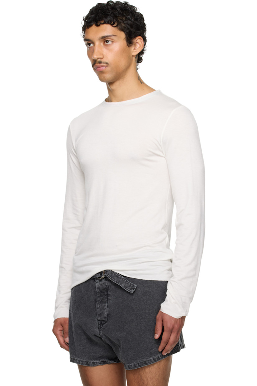 Polyester jersey T-shirt.

· Raw edge at crewneck, hem, and cuffs
· Satin trim at inner collar

Part of the exclusive SSENSE HEAT capsule. 

Supplier color: White jersey