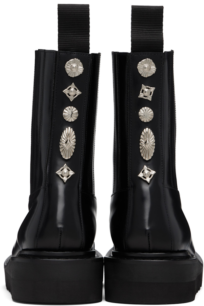 Calf-high buffed leather boots.

· Zip closure
· Leather-covered elasticized gussets
· Pull-loop at collar
· Engraved hardware at heel counter
· Leather lining
· Treaded foam rubber platform sole
· Platform: H1.75"

Supplier color: Black