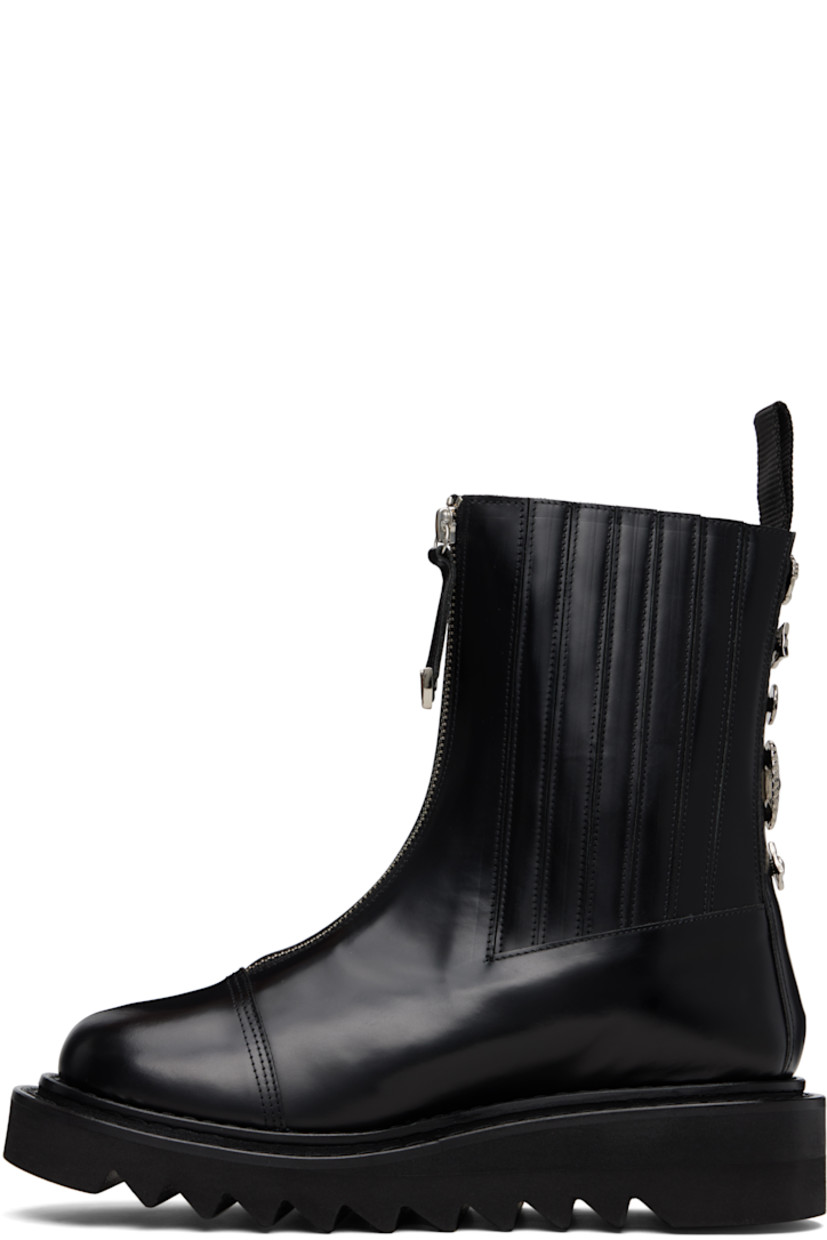 Calf-high buffed leather boots.

· Zip closure
· Leather-covered elasticized gussets
· Pull-loop at collar
· Engraved hardware at heel counter
· Leather lining
· Treaded foam rubber platform sole
· Platform: H1.75"

Supplier color: Black