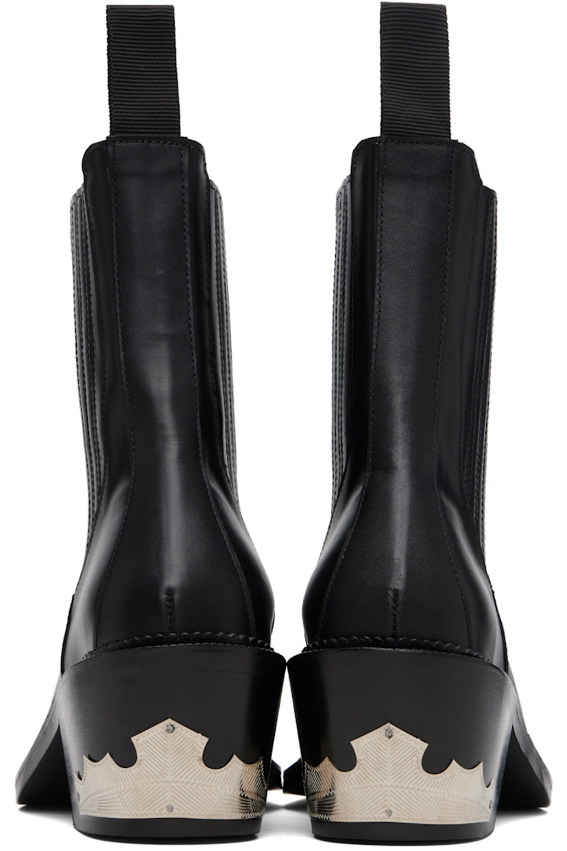 Ankle-high buffed leather boots.

· Square toe
· Leather-covered elasticized gussets
· Pull-loop at heel collar
· Leather lining
· Stacked leather heel
· Treaded rubber sole
· Heel: H2.75"

Supplier color: Black
