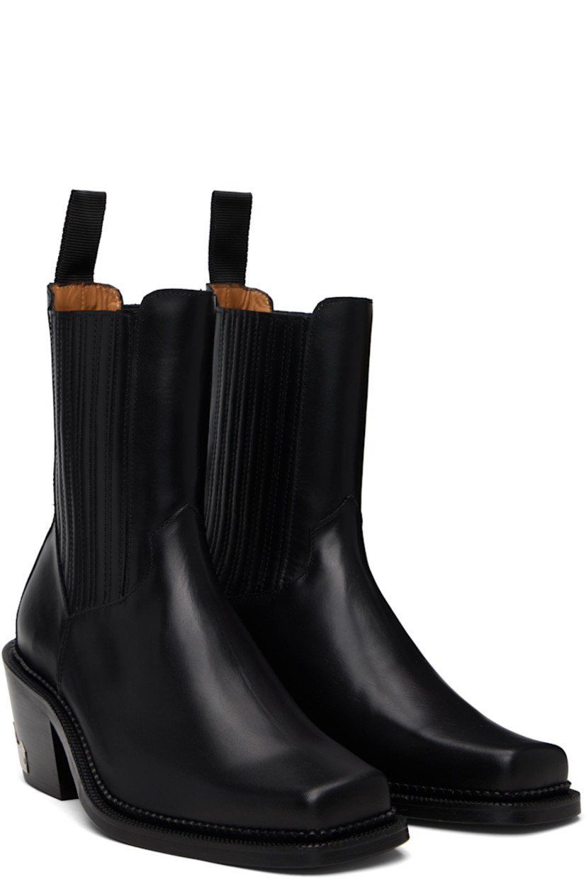 Ankle-high buffed leather boots.

· Square toe
· Leather-covered elasticized gussets
· Pull-loop at heel collar
· Leather lining
· Stacked leather heel
· Treaded rubber sole
· Heel: H2.75"

Supplier color: Black