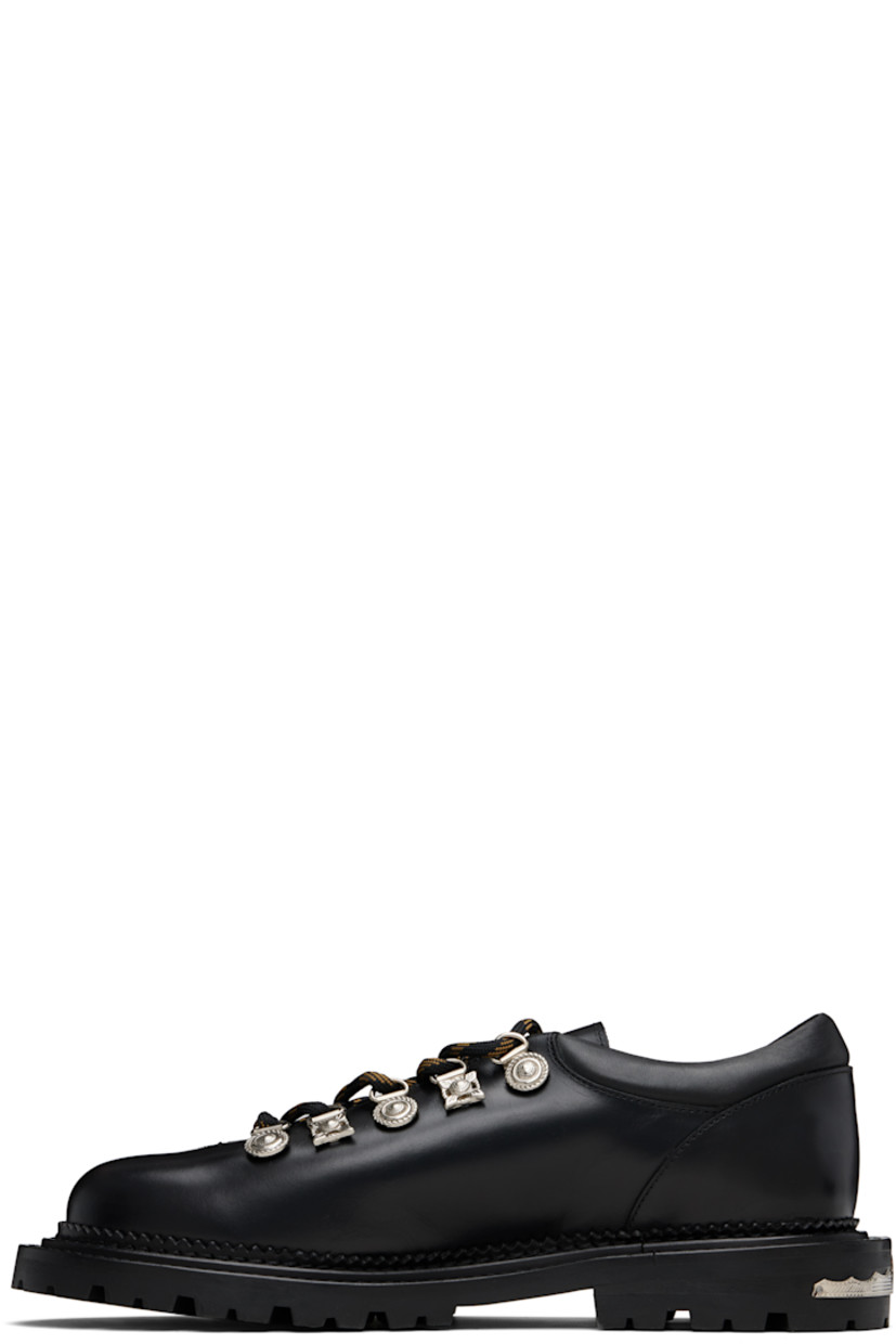 Polished leather derbys.

· Lace-up closure with engraved charms
· Padded leather collar
· Serrated edge at welt
· Etched plaque at heel 
· Treaded rubber sole

Supplier color: Black