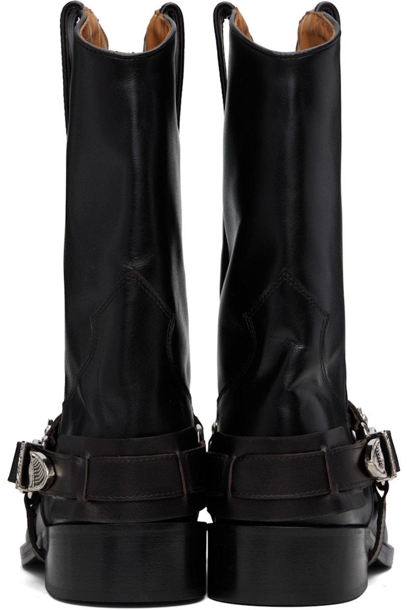 Calf-high grained leather cowboy-style boots.

· Square toe
· Embroidered detailing at vamp
· Detachable harness-style strap
· Pull-loops at collar
· Leather lining
· Block heel
· Leather sole with rubber heel
· Heel: H1.75"

Available exclusively at SSENSE. 

Supplier color: Dark Brown