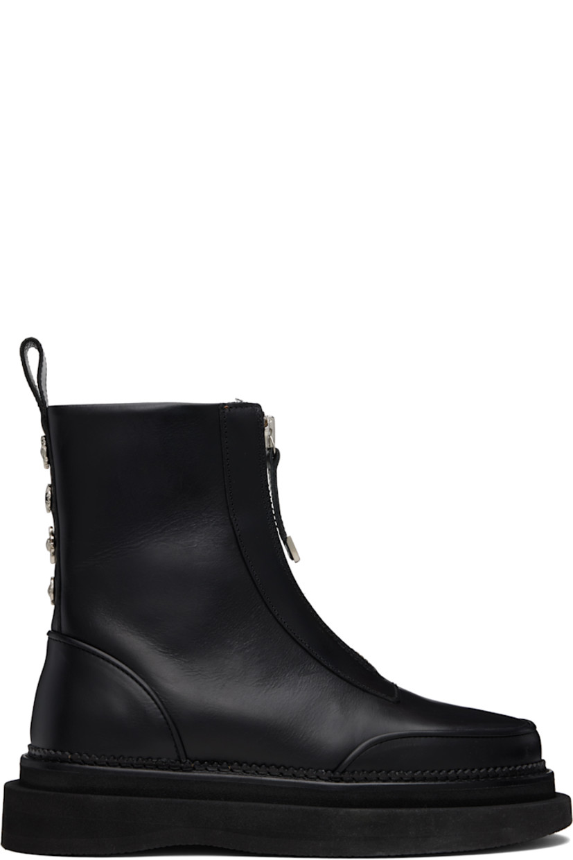 Ankle-high polished leather boots.

· Piping at moc toe and heel
· Zip closure
· Pull-loop at heel collar
· Engraved hardware at heel counter
· Leather lining
· Foam rubber platform sole
· Platform: H2"

Supplier color: Black