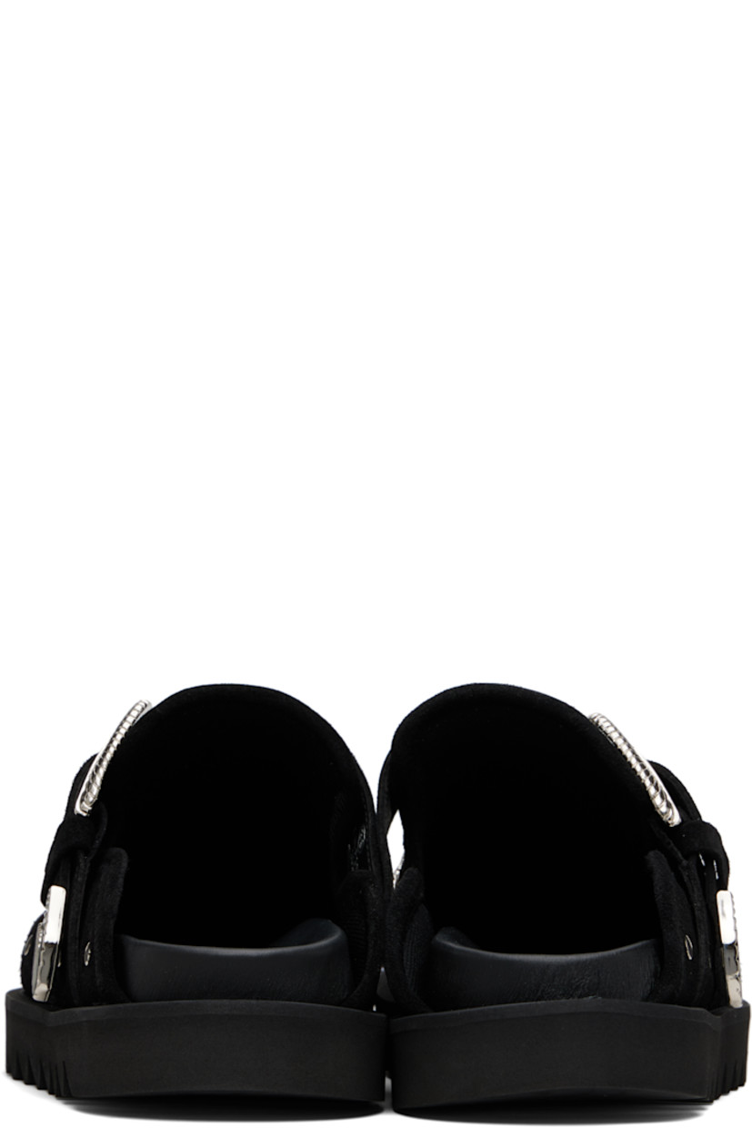 Suede slip-on loafers.

· Studs at toe and sides
· Graphic hardware and metal eyelets at vamp
· Pin-buckle strap at vamp
· Mesh lining
· Foam rubber midsole
· Treaded rubber sole

Available exclusively at SSENSE.

Supplier color: Black
