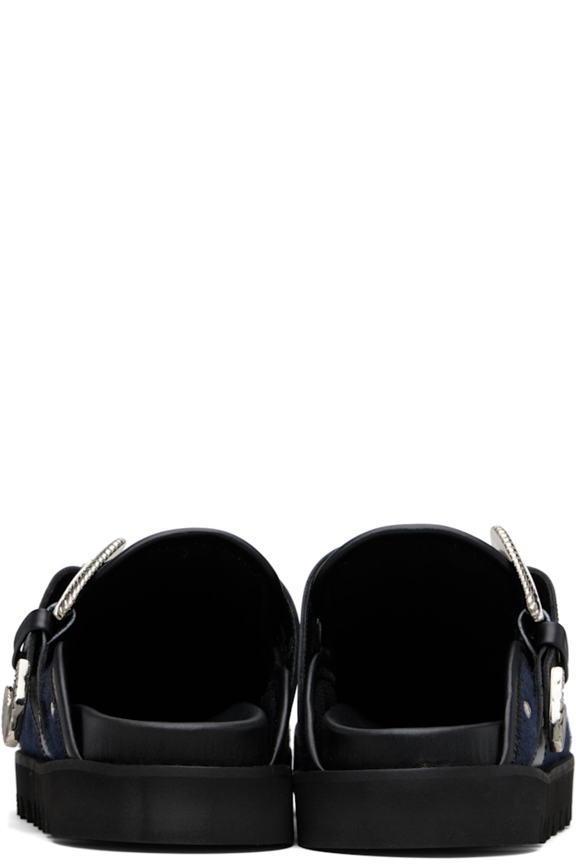 Melton slip-on loafers.

· Studs at toe and sides
· Graphic hardware and metal eyelets at vamp
· Pin-buckle strap at vamp
· Mesh lining
· Foam rubber midsole
· Treaded rubber sole

Available exclusively at SSENSE.

Supplier color: Black/Navy