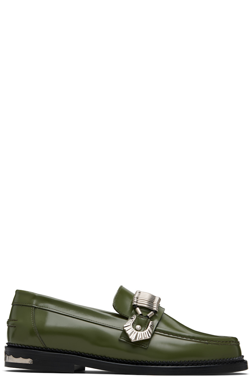 Polished leather loafers.

· Moc toe
· Strap with hardware at vamp
· Pinched seam at heel counter
· Serrated edge at welt
· Engraved plaque at heel
· Stacked leather heel with rubber injection
· Leather sole

Available exclusively at SSENSE.

Supplier color: Khaki