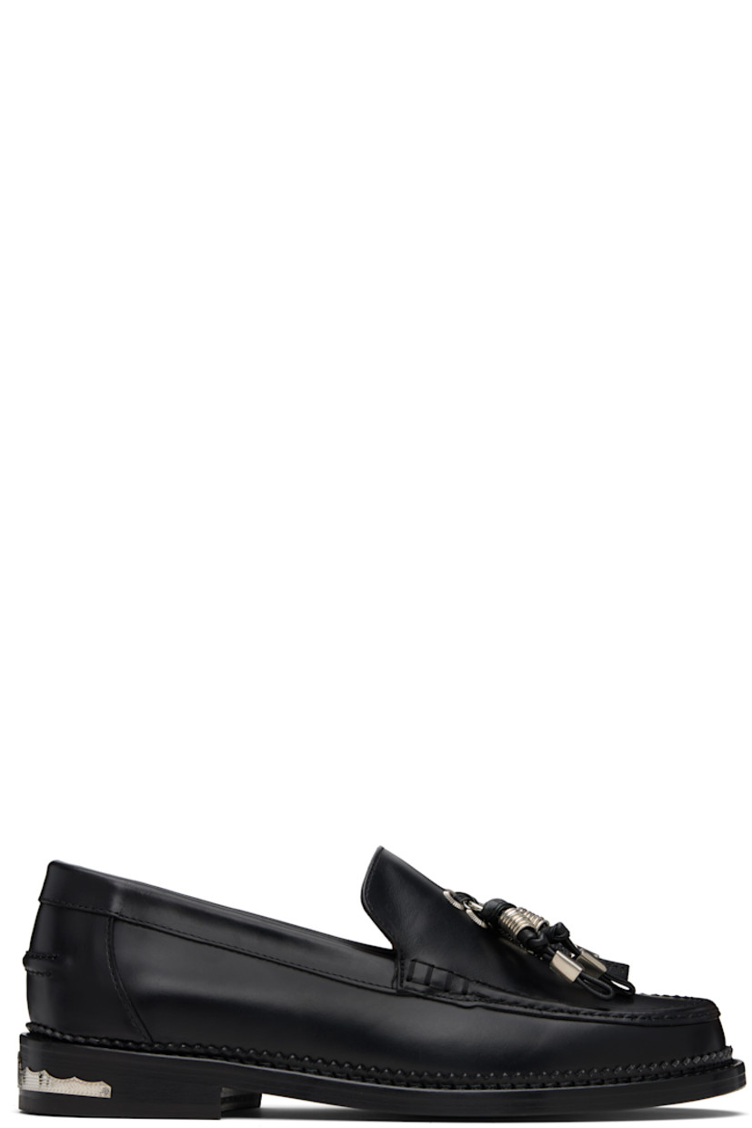 Buffed leather loafers.

· Moc toe
· Knotted strap with O-rings at vamp
· Pinched seam at heel counter
· Serrated edge at welt
· Engraved plaque at heel
· Stacked leather heel with rubber injection
· Leather sole

Supplier color: Black