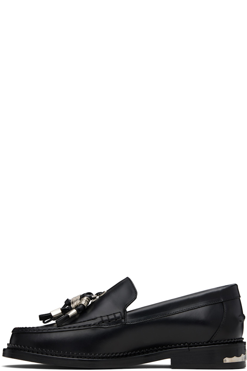 Buffed leather loafers.

· Moc toe
· Knotted strap with O-rings at vamp
· Pinched seam at heel counter
· Serrated edge at welt
· Engraved plaque at heel
· Stacked leather heel with rubber injection
· Leather sole

Supplier color: Black