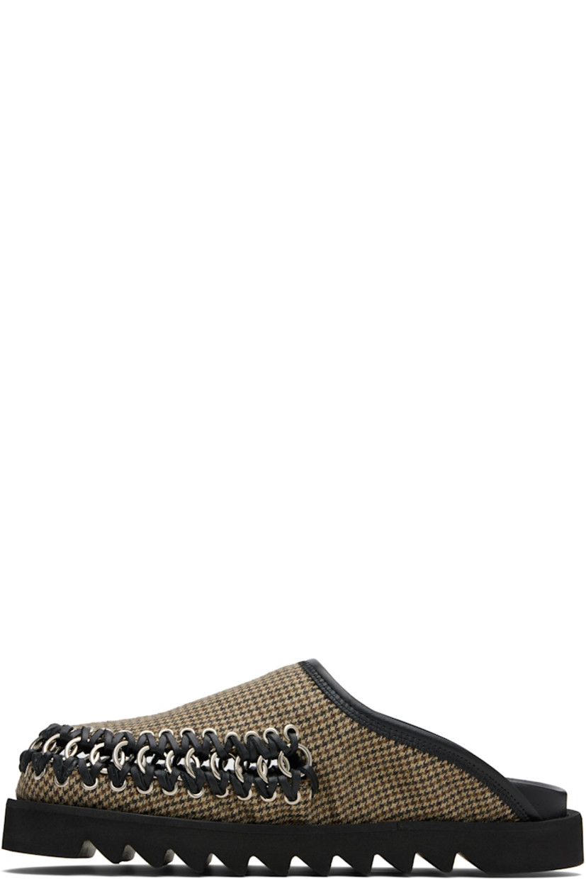 Flannel slip-on loafers.

· Prince of Wales pattern throughout
· Cutout with O-rings at toe
· Buffed leather lining
· Foam rubber midsole
· Treaded rubber sole

Supplier color: Brown