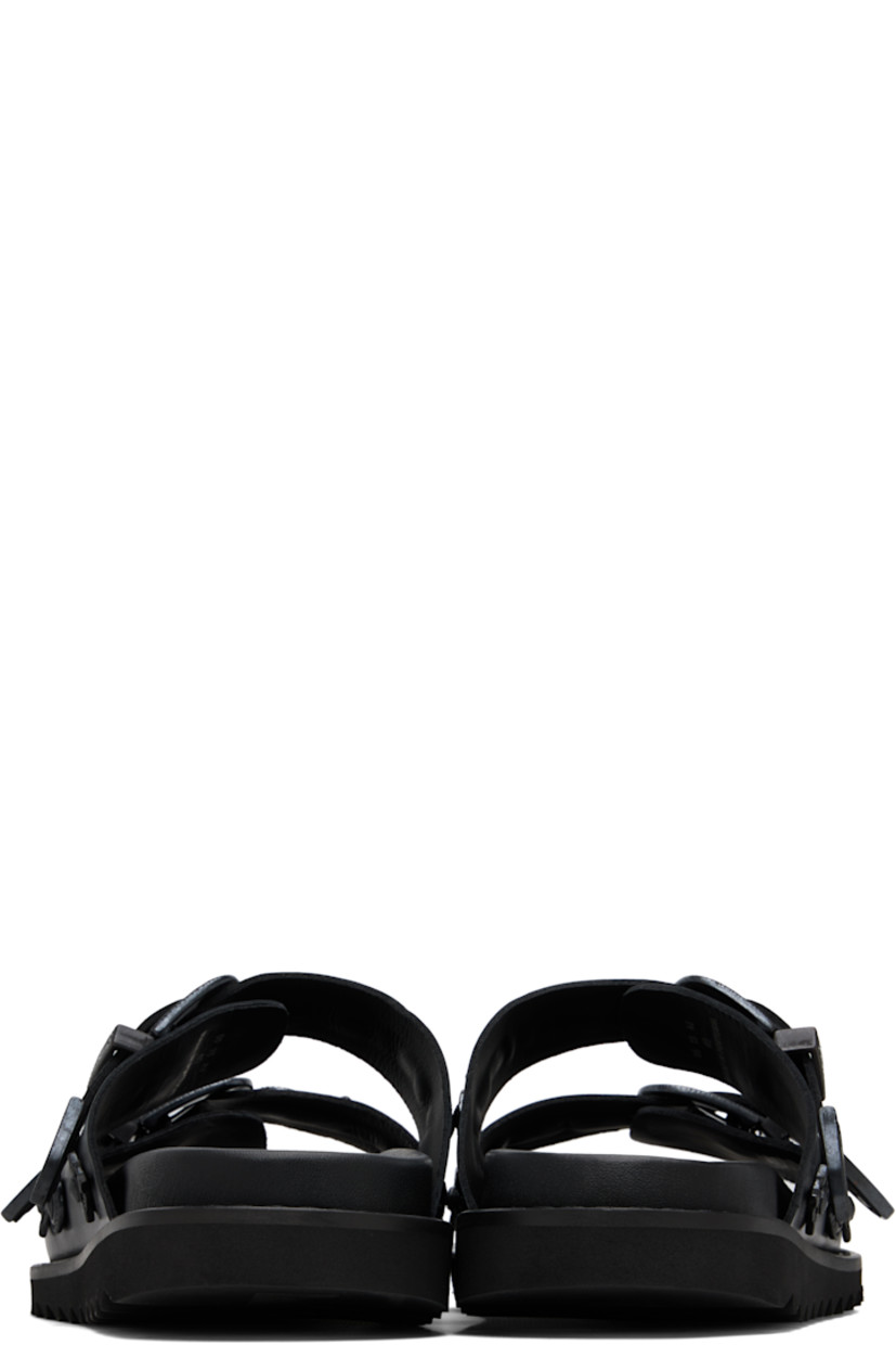 Buffed leather sandals.

· Graphic hardware throughout
· Open toe
· Pin-buckle straps at vamp
· Logo stamp at molded footbed
· Foam rubber midsole
· Treaded rubber sole

Available exclusively at SSENSE.

Supplier color: Black tonal