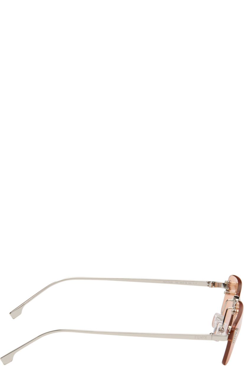 Rectangular rimless metal-frame sunglasses.

· Orange lenses 
· 100% UVA/UVB protection, category 2
· Adjustable rubber nose pads
· Crystal-cut logo at face
· Logo engraved at temples
· Includes pouch
· Size: 54.16 135 

Supplier color: Shiny palladium/